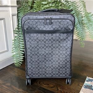 Beautiful Coach suitcase, great condition. Used only once.